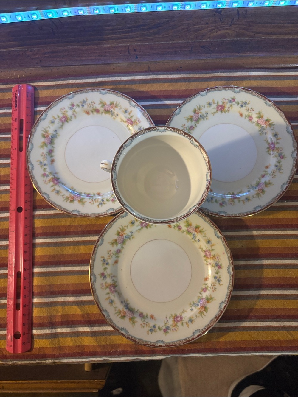 Fine Porcelain Tea Cup and Saucer Set in Ivory with Floral Trim
